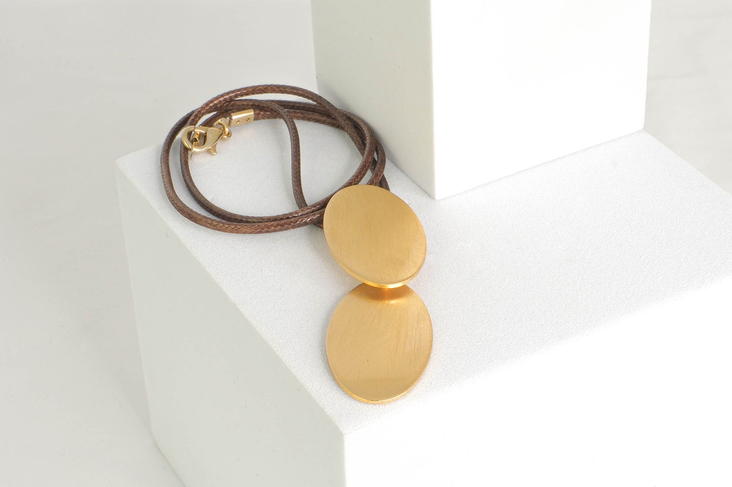 Dynamic Gold Oval Pendant Necklace