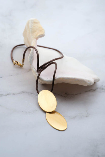Dynamic Gold Oval Pendant Necklace
