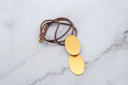 Dynamic Gold Oval Pendant Necklace